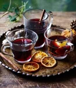Mulled Wine served in Frosted Glasses with Mince Pies and Fresh Cream Mulled Wine served in Frosted Glasses with Mince Pies and Fresh Cream